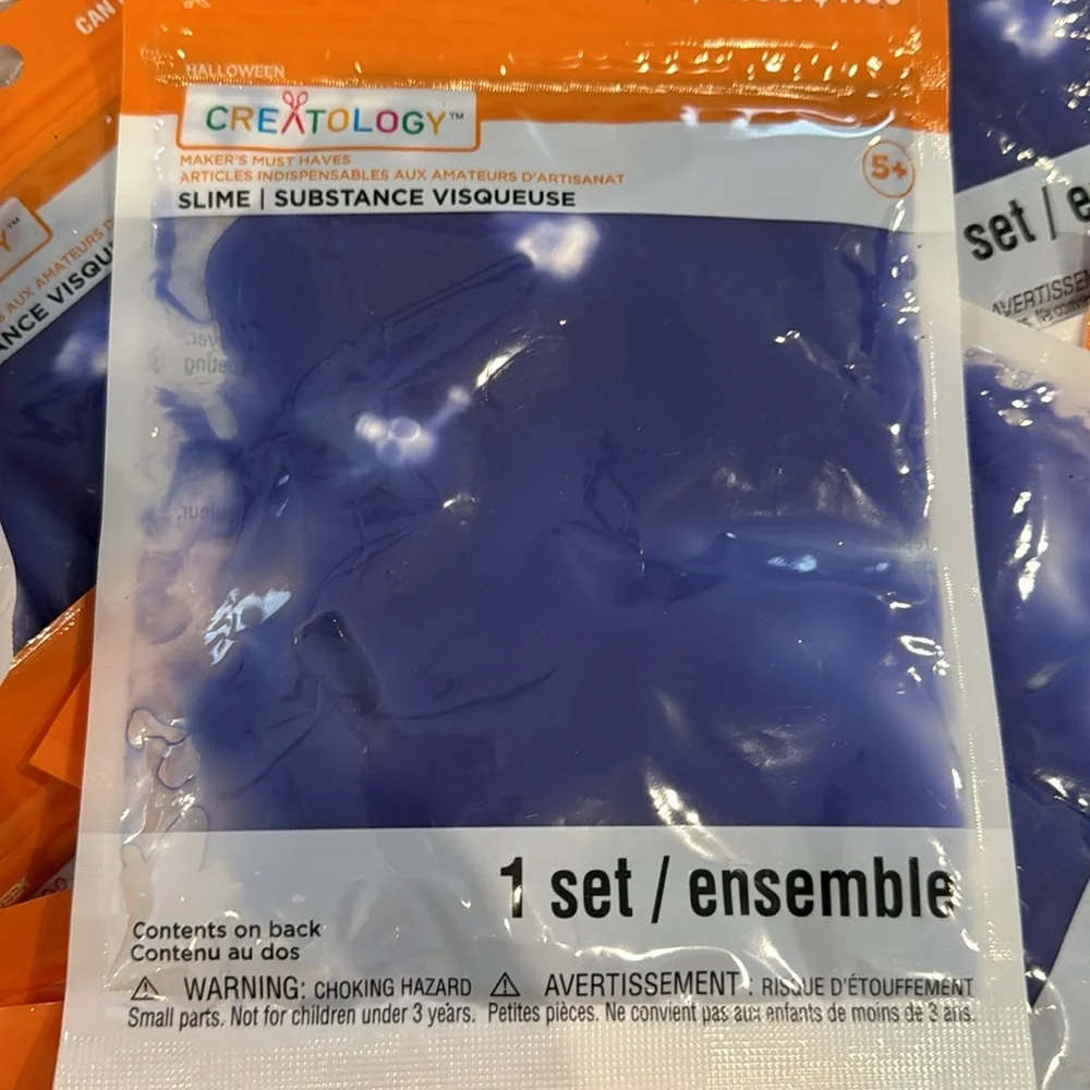 35 packets of Slime with creepy crawlers in it. 18 reddish and 17 Blue/purple.